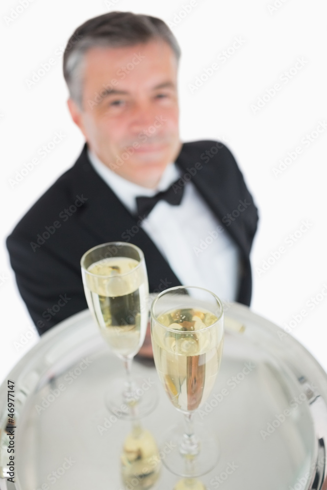 Close up of tray with glasses of champagne Close up of tray with glasses of champagne