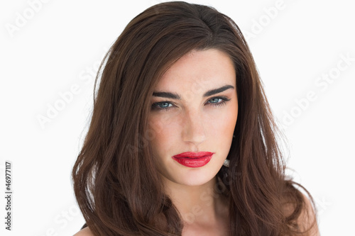 Woman with red lips staring at camera
