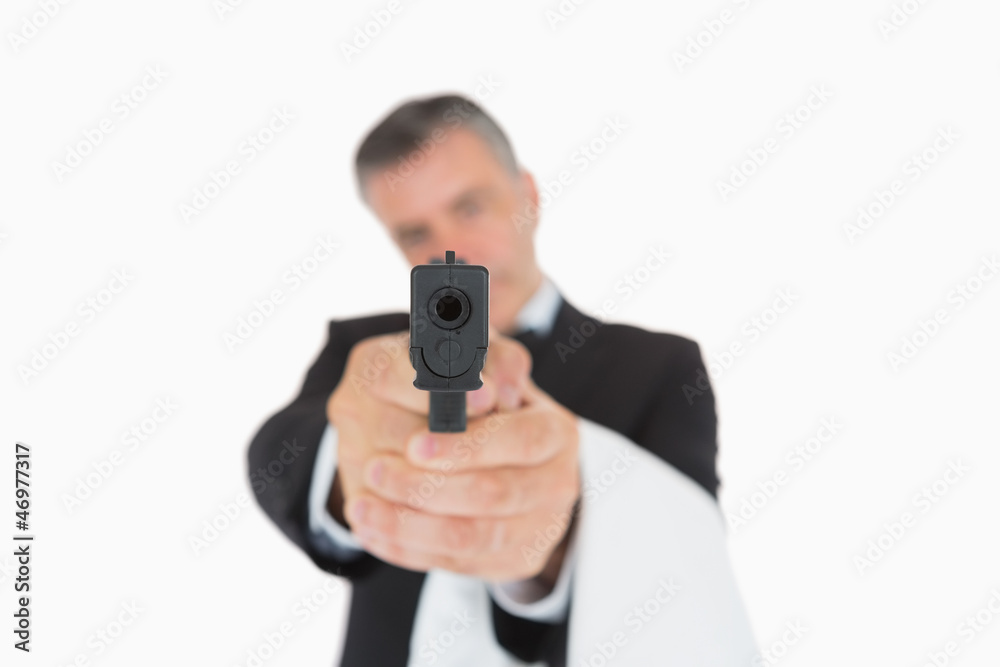 Waiter holding gun directly ahead