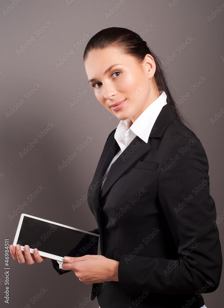 A young businesswoman holding her digital tablet pc A young businesswoman holding her digital tablet pc
