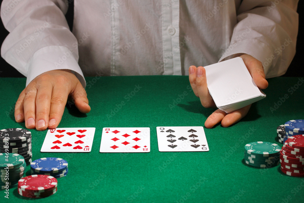 Poker setting on green table Poker setting on green table