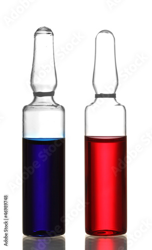 medical ampules with red and blue liquid, isolated on white