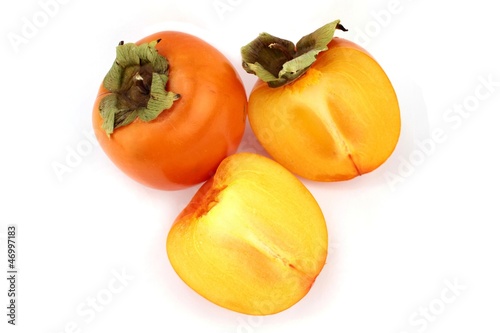 Persimmon or kaki fruit on white background.