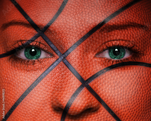 Basketball pattern on woman face photo