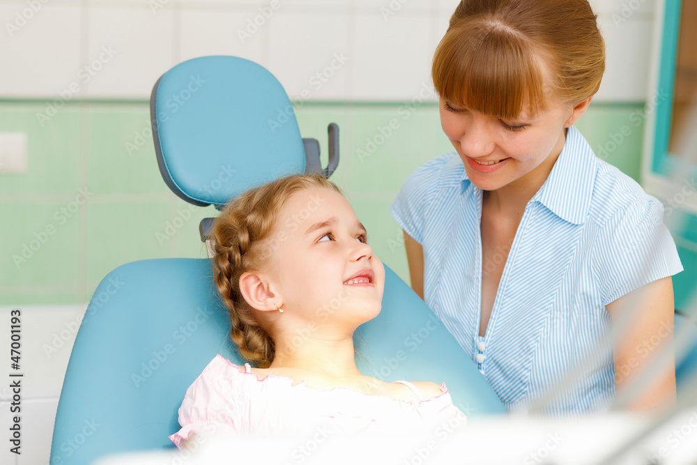 Little girl visiting dentist Little girl visiting dentist