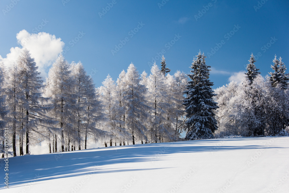 Fototapeta premium Snowy mountain scenery with deep blue sky