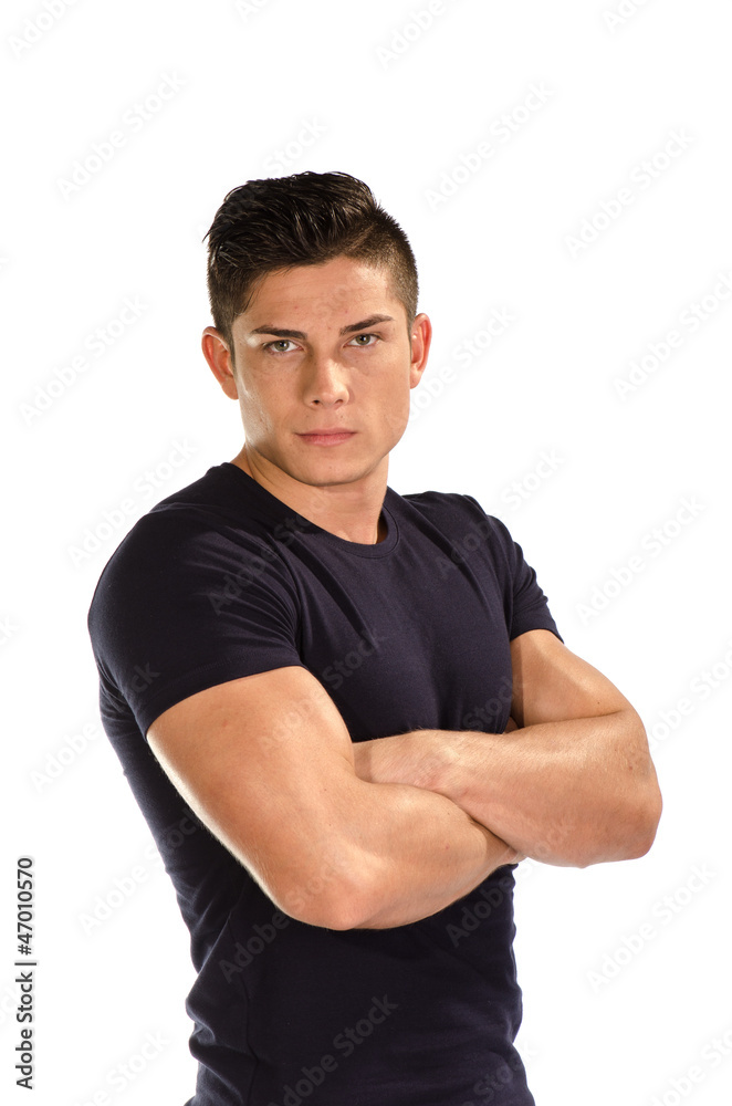 Muscular man with folded arms