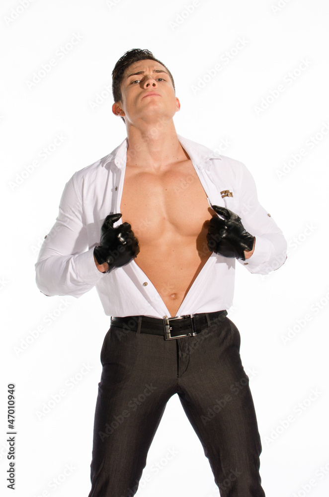 Portrait of young muscular man unbuttoned his shirt Portrait of young muscular man unbuttoned his shirt
