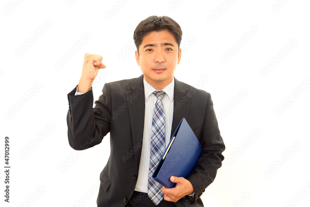 ガッツポーズのビジネスマン