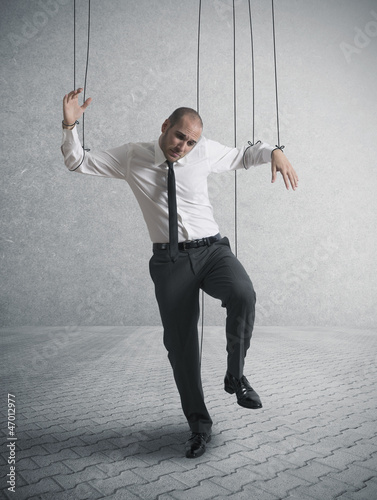 Fotografie Controlled businessman