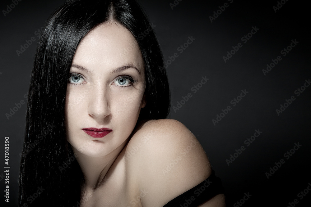 Fototapeta premium Portrait of beautiful girl with black hairs