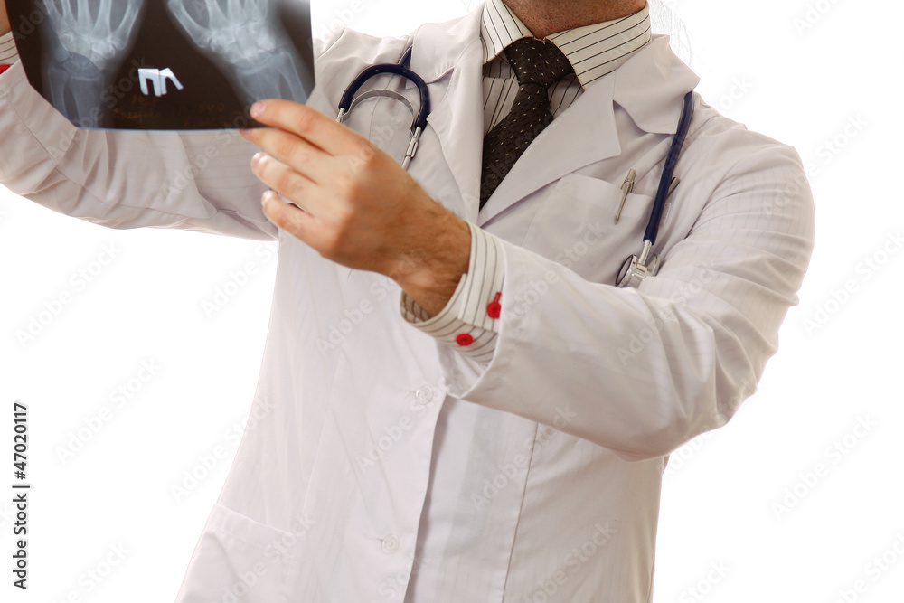 A young male doctor with an X-ray picture A young male doctor with an X-ray picture