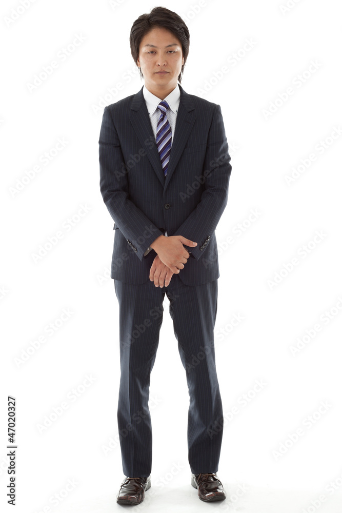 standing young businessman standing young businessman