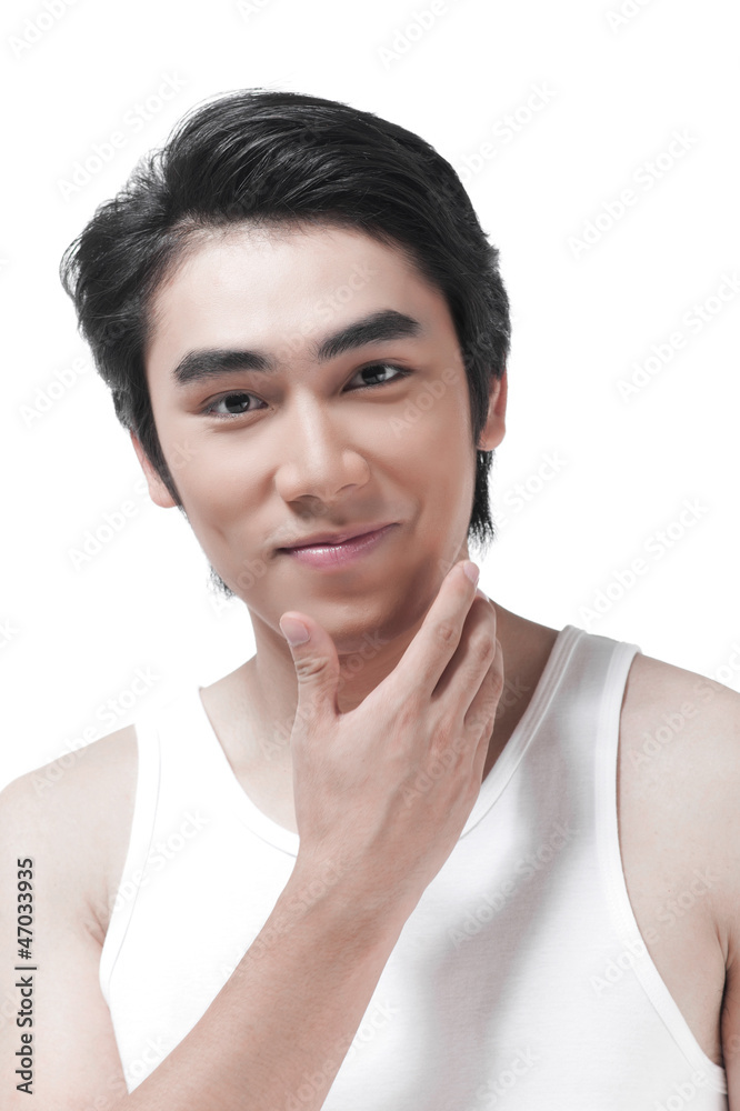 A happy young man with cleaning face after shaved A happy young man with cleaning face after shaved
