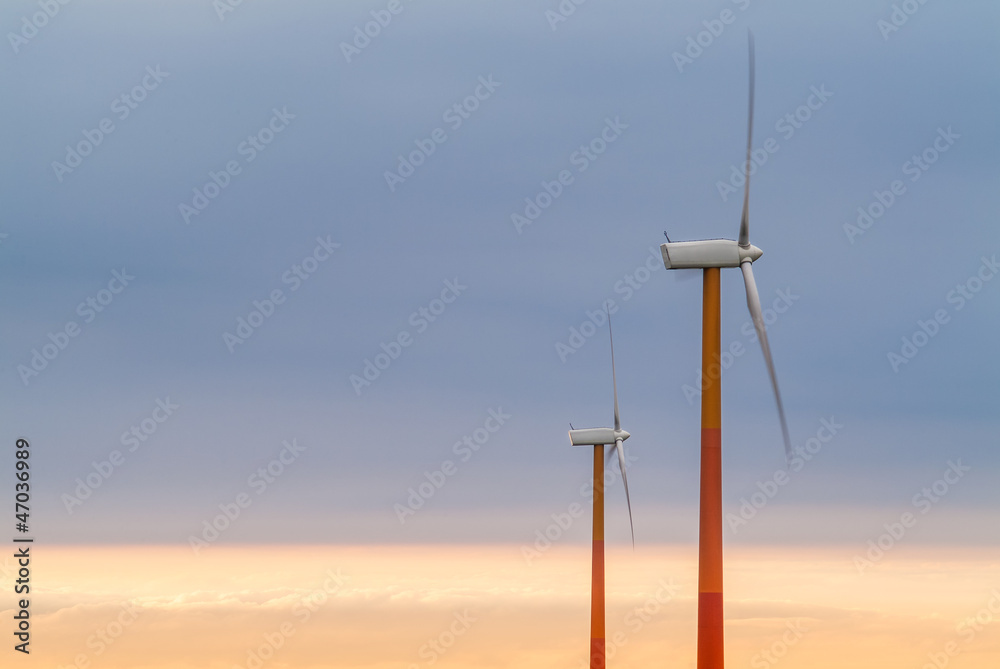 Fototapeta premium Red and orange wind turbines
