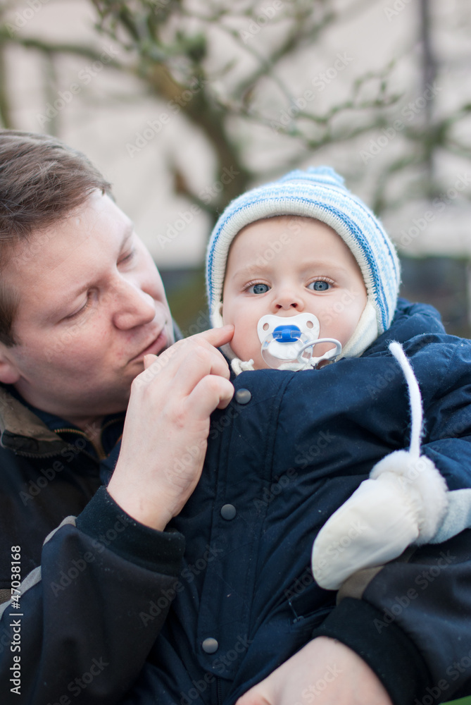 Young father and baby on cold winter day Young father and baby on cold winter day