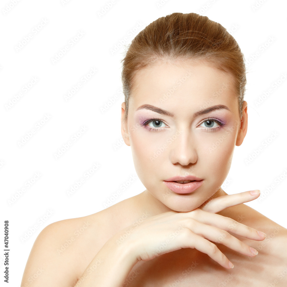 Woman beauty face closeup with clean skin and pink soft makeup
