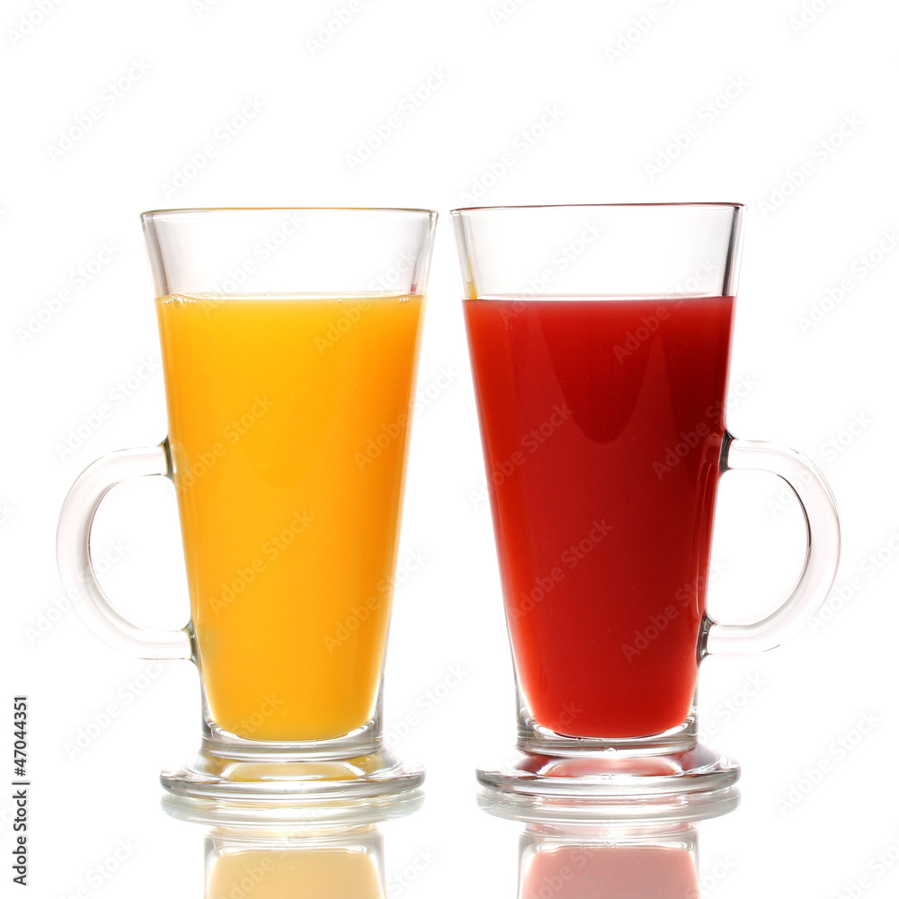 Tropical juices in glasses isolated on white Tropical juices in glasses isolated on white