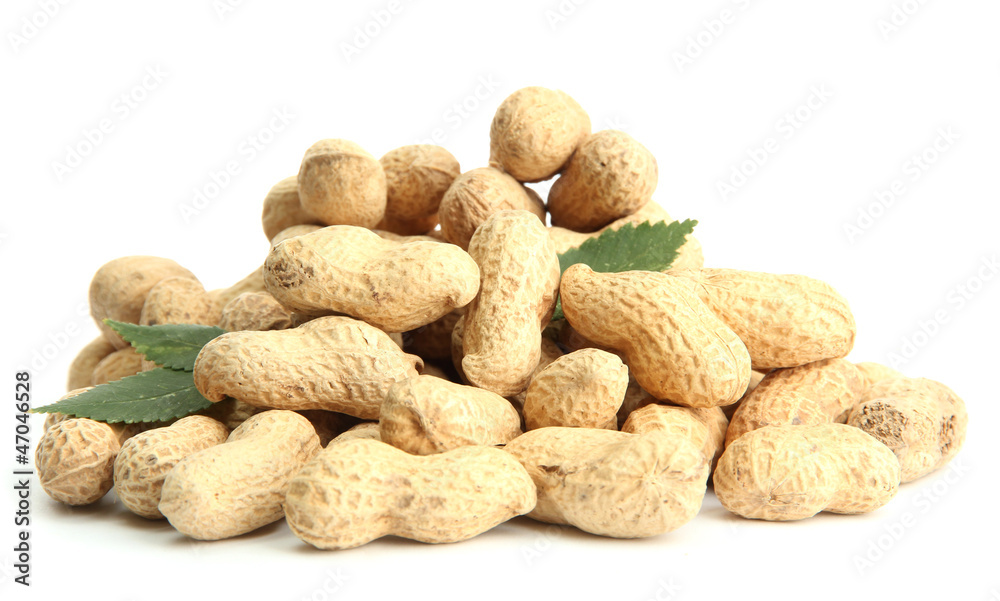 tasty peanuts with leaves, isolated on white tasty peanuts with leaves, isolated on white