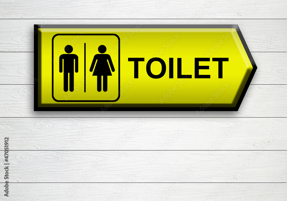 toilet sign on white wooden wall toilet sign on white wooden wall