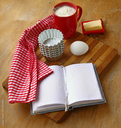 Recipe book on the table in the kitchen photo