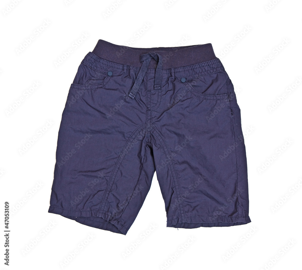 Children's wear - blue shorts isolated on a white background Children's wear - blue shorts isolated on a white background