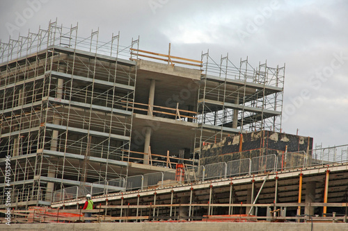 scaffolding n a construction site of a large concrete building