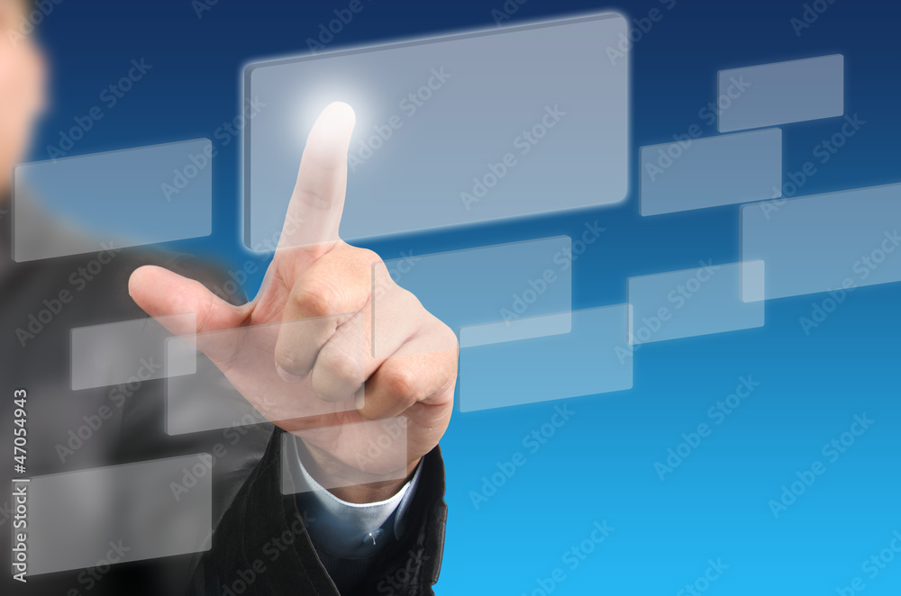 Businessman pressing on touch screen Businessman pressing on touch screen