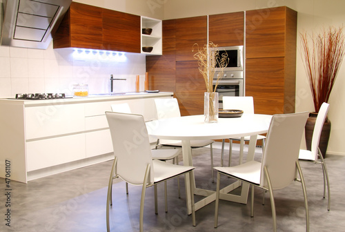 Modern kitchen with white table