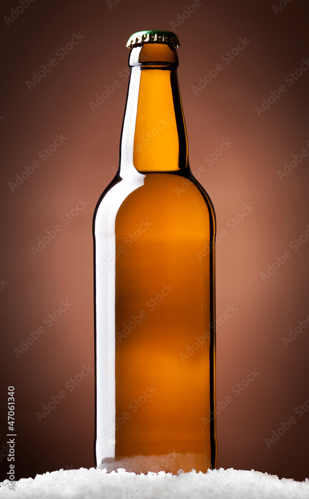 bottle of beer on a brown