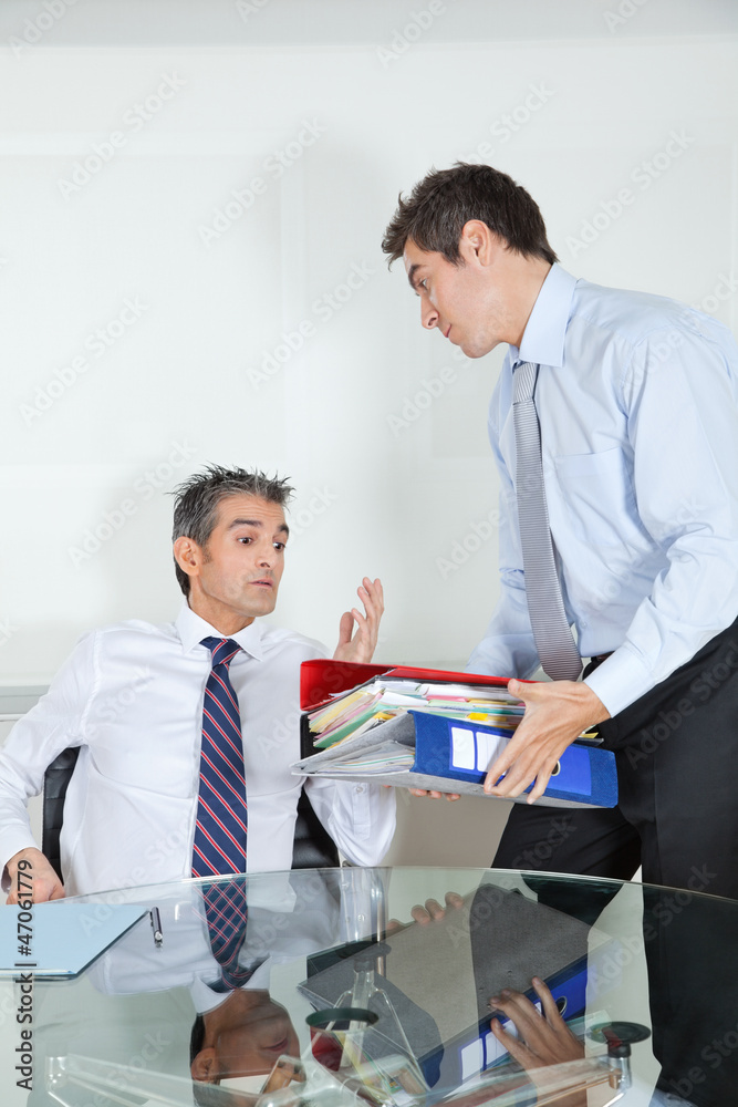 Businessmen Overwhelmed By Load Of Work Businessmen Overwhelmed By Load Of Work