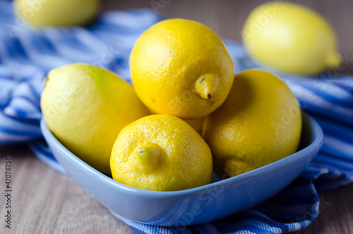 Lemons in the bowl on the table