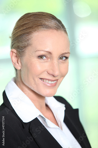 Profile view of blond businesswoman