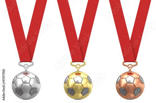 Gold, silver and bronze soccer ball with red ribbons