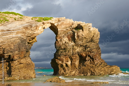 Las Catedrales beach, Ribadeo, Spain. Last ray of sun in the ear