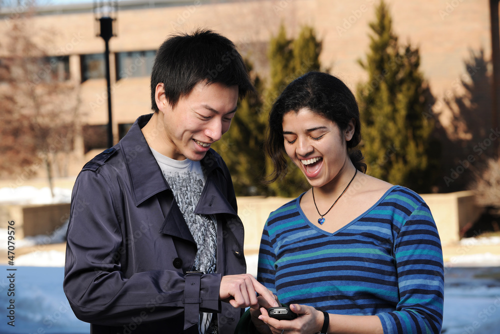 College Students with cell phone College Students with cell phone