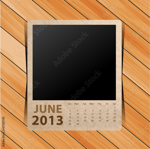 Calendar 2013, blank photo on wooden background
