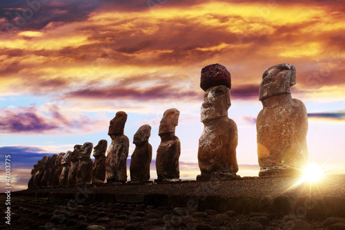 Standing moai in Easter Island at sunrise photo