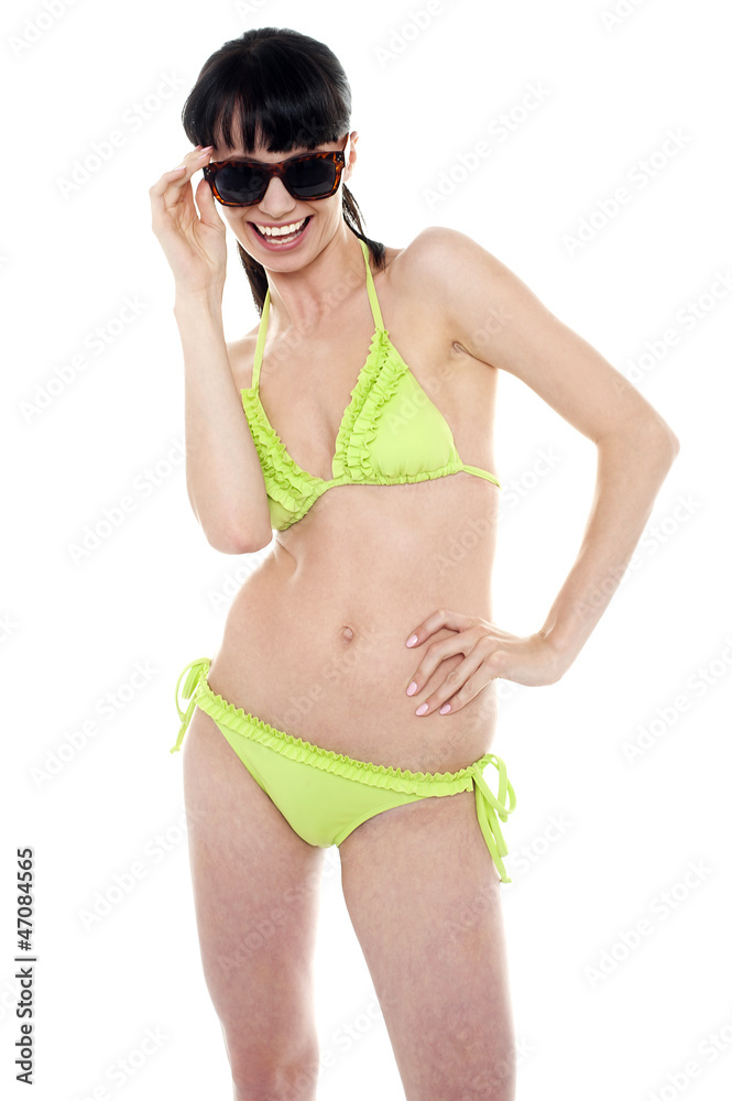 Fototapeta premium Sexy woman smiling in bikini top and underwear