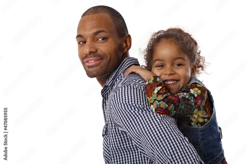 Handsome ethnic father and little girl piggyback Handsome ethnic father and little girl piggyback