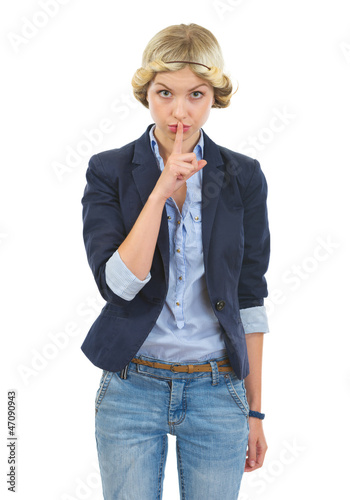Fotografía Teenage girl showing shh gesture