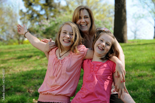 Young Mother and daughters having fun