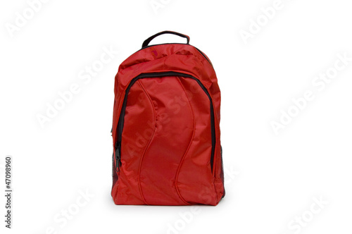 Red school backpack isolated on white