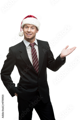 young smiling businessman in santa hat