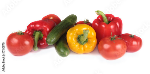 paprika, tomatoes and cucumber isolated on white