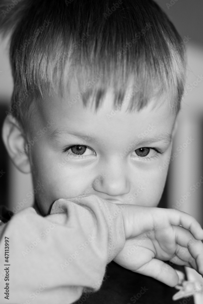 beautiful kid closes hands a smile beautiful kid closes hands a smile