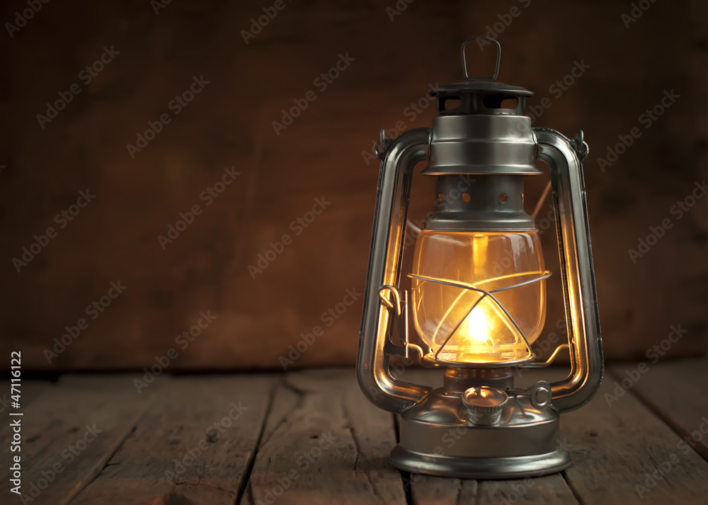 Oil Lamp at Night on a Wooden Surface Oil Lamp at Night on a Wooden Surface