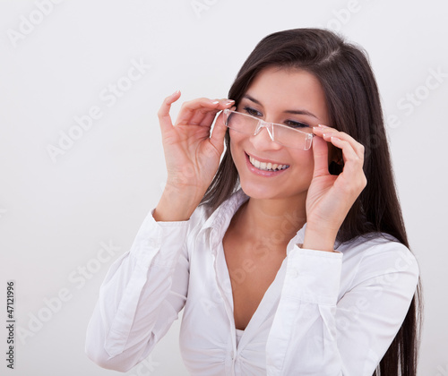 Happy woman wearing reading glasses