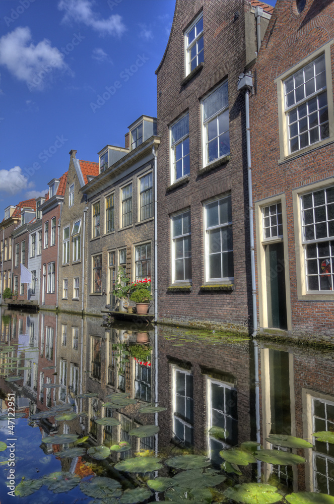 Houses on a canal in Delft Houses on a canal in Delft