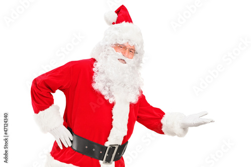 A happy santa claus gesturing